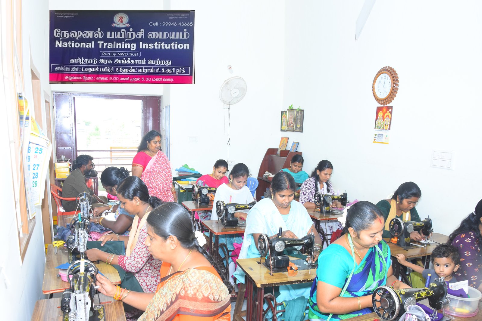 Women practicing machine stitching and garment assembly at the NWDT training institution