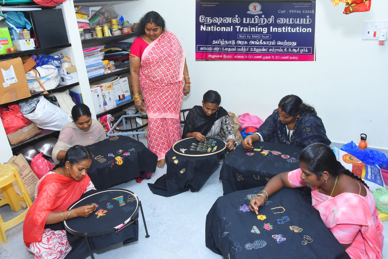 Women and children gathered for an NWDT community programme